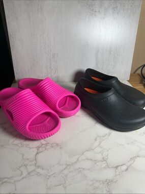 Two pairs of men’s size 11 crocs slides + black pair